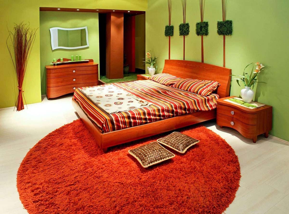 Спальня в зеленом и терракотовом цвете